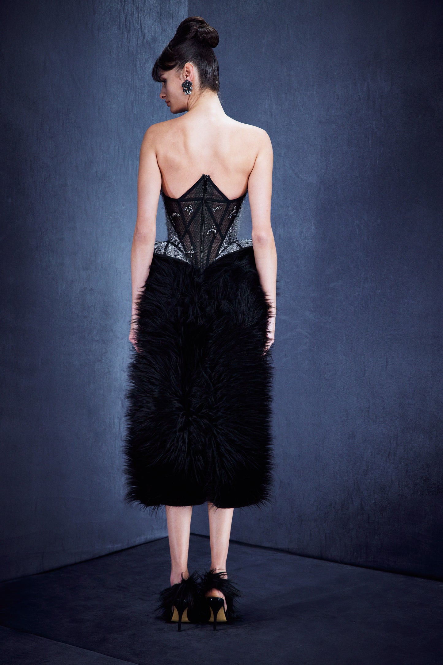 Corseted fur dress