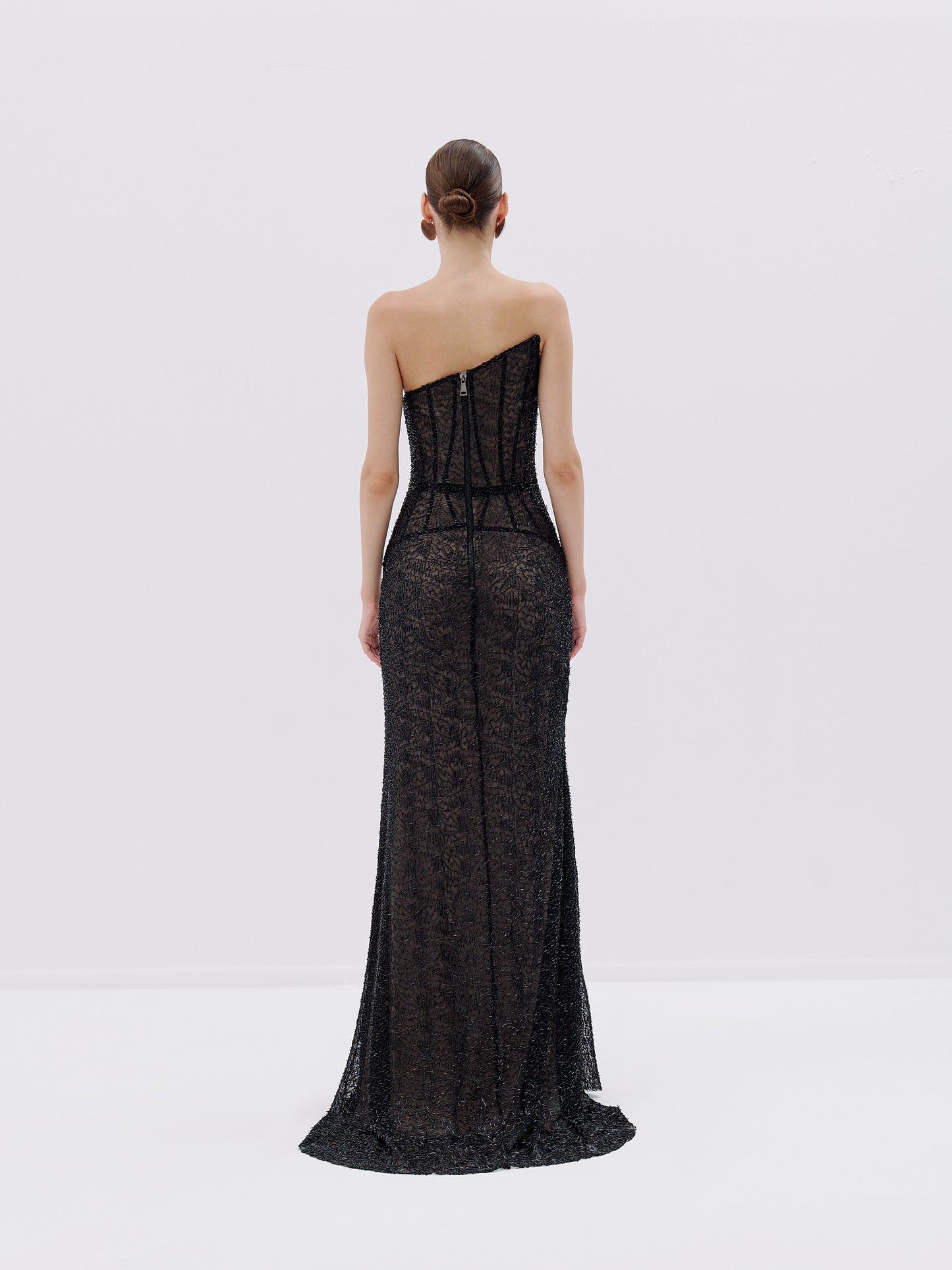 Lace gown with corset detailing.